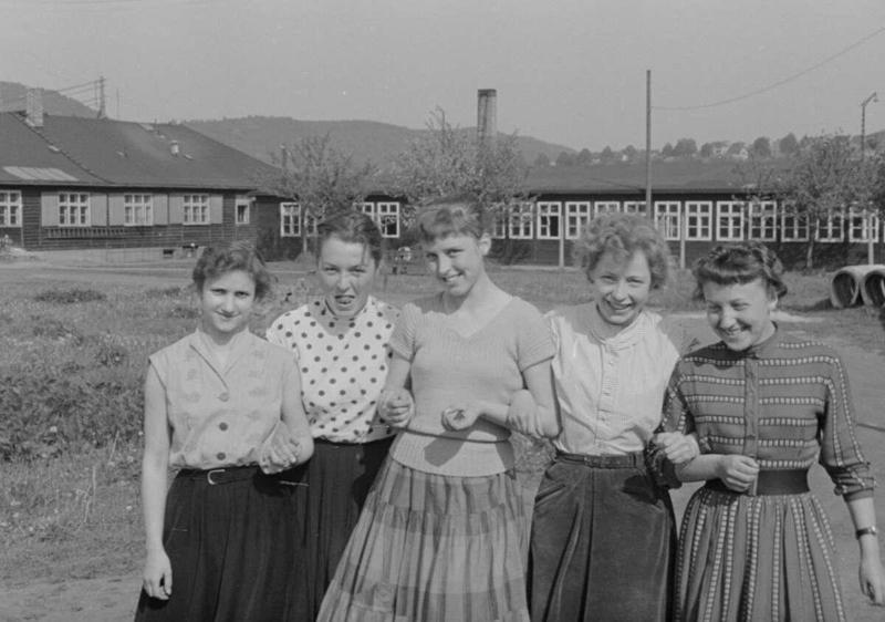 6. Girls from Germany in 1955 1. A couple of the parents hanging around back in 1955, 2. A London record store back in 1955 with customers hanging out in their lovely listening booths, 3. A Debutant Ball back in 1955, 4. A couple of the grandparents hanging out in their home back in 1955 in Illinois, 5. Spain, circa 1955, 6. Girls from Germany in 1955, 7. Throwing it all the way back to July 2nd, 1955, 8. A lovely shot from school out in Sweden in 1955, 9. Manhattan, Times Square, 1955, 10. Hanging in the kitchen in New York, 1955, 11. The fish was delightful back in 1955, 12. Riding in the front with mom in 1955, 13. Drag racing in Los Angeles in 1955, 14. East Pender Street in Vancouver, BC, 1955, 15. A man bragging out in Spain in 1955, 16. East Harlem, New York City, circa 1955, 17. Harris and McKeever Market in Pittsburgh, circa 1955, 18. Commuters reading their newspapers on a train in Philadelphia, circa 1955, 19. A solid roller skating faceplant moment, 20. The scooter kids hanging out in Bonn, Germany, 1955, 21. All aboard for that sweet Saturday afternoon matinee, 22. Women and children hanging out at a pier in Hong Kong, circa 1955, 23. A busy mom out in New Rochelle, New York, 1955