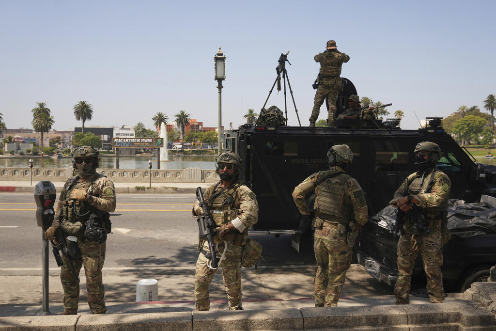 What happened and was anyone arrested?, What's the history of MacArthur Park?, What did the Guard do?, Why were military troops in Los Angeles?, How did the community react?