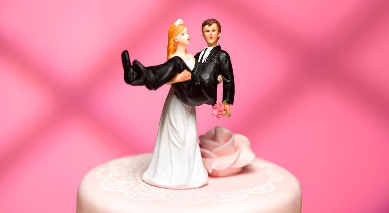 Carrying the bride over the threshold Some wedding traditions aren’t as 'innocent' as you think, The bridal veil, Exchanging rings, Carrying the bride over the threshold, The wedding cake, The bride’s garter, Stepping on a glass, Bride kidnapping
