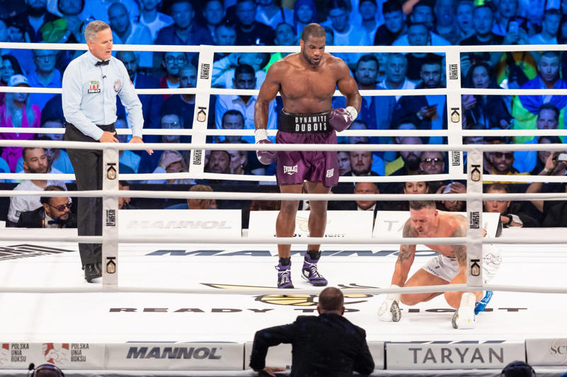 2023 controversy Saturday night lights at Wembley, Titles on the line, Frank Warren on the main stage, "I'm confident", Knockout, Usyk's boxing pedigree, A strong opponent, 2023 controversy, Real or fake?, The support of a nation, Becoming the first