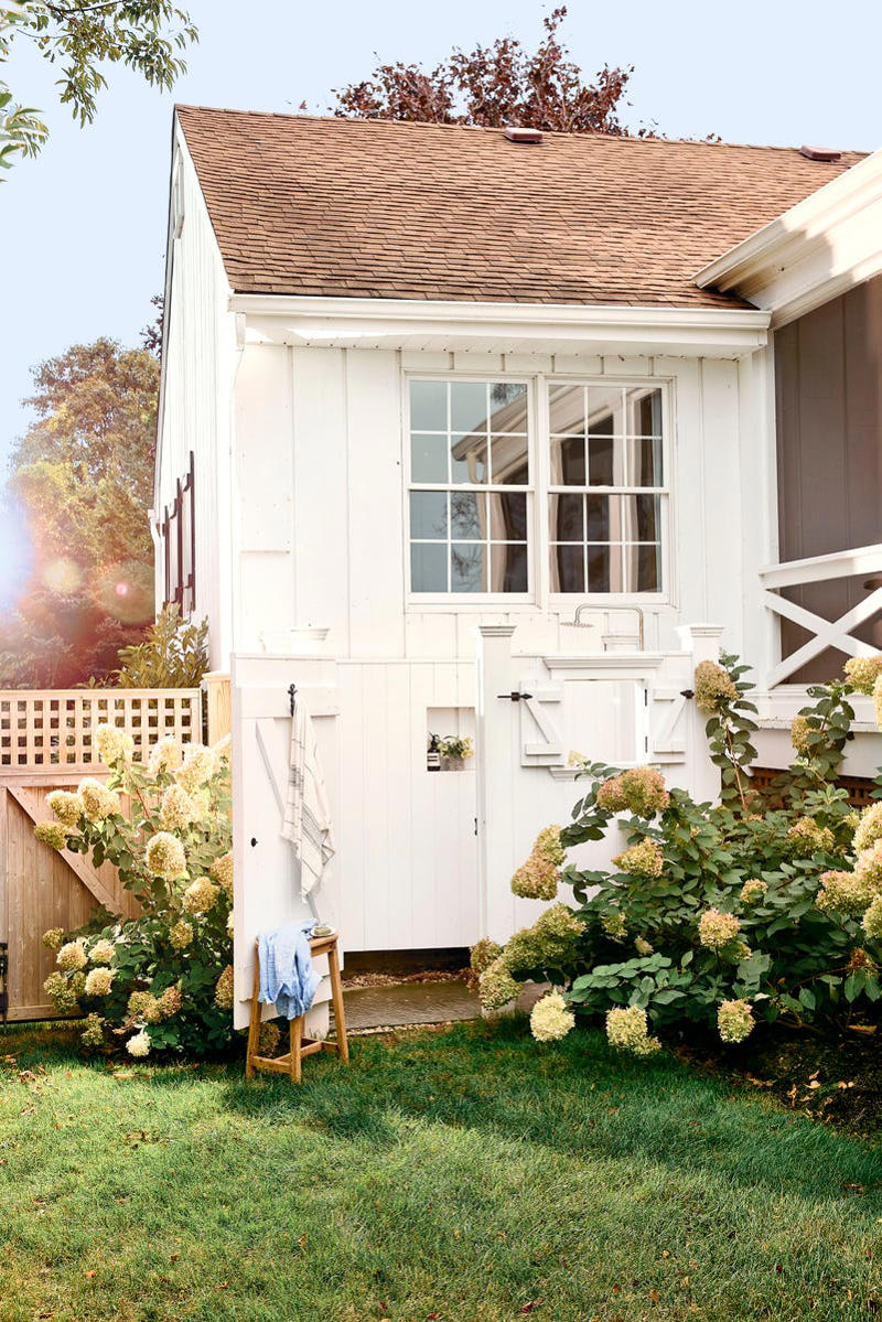 A Light-Filled Welcome, Slipcovered Seating in the Living Room, A Crisp, White Kitchen, A Light & Bright Dining Room, A High Contrast Powder Room, Natural Materials, Off-the-Shelf Meets Antiques, Estate Sale Scores, A Multi-Purpose Screened-In Porch, Dreamy Poolside Living, An Outdoor Shower