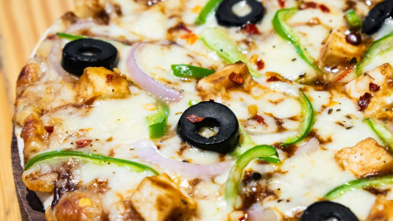 1. Pineapple, 2. Anchovies, 3. Olives, 4. Broccoli, 5. Spinach, 6. Eggplant, 7. Artichokes, 8. Hot Peppers, 10. Corn, 1. Pepperoni, 2. Mushrooms, 3. Onions, 4. Sausage, 5. Bacon, 6. Extra Cheese, 7. Chicken, 8. Green Peppers, 10. Sun-dried Tomatoes