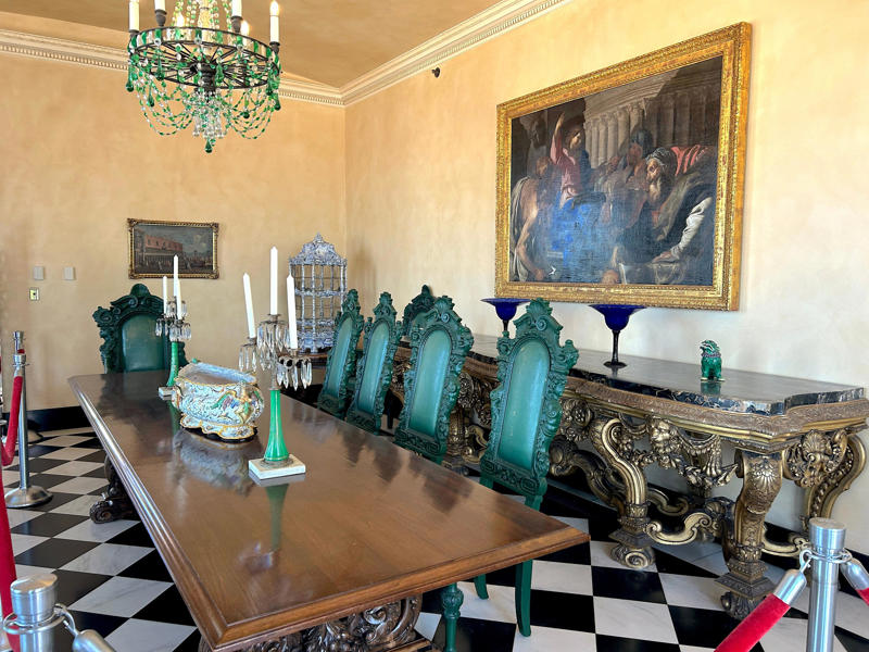 A place for informal dining, the breakfast room sits on the other side of the mansion. Colored glass windows bring Sarasota's Gulf Coast into the mansion., The ballroom and its ornate ceiling are standout features of the property., The ballroom ceiling is comprised of 22 custom canvases., The formal dining room features design inspirations from all over the Mediterranean., Often, guests arrived by sea., Visitors to Ca' d'Zan can also enjoy the Ringlings' circus museum., The Ringlings' legacy continues to dazzle visitors.