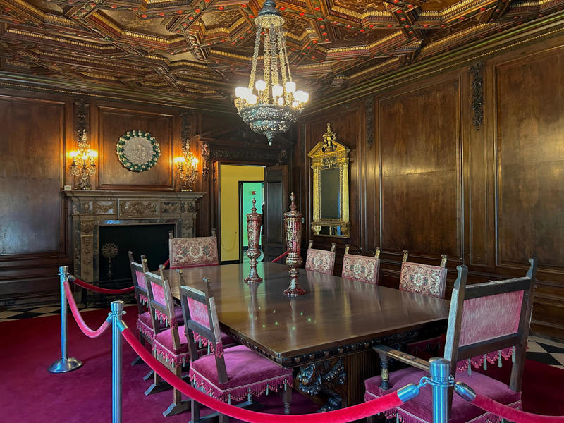 The formal dining room features design inspirations from all over the Mediterranean. Colored glass windows bring Sarasota's Gulf Coast into the mansion., The ballroom and its ornate ceiling are standout features of the property., The ballroom ceiling is comprised of 22 custom canvases., The formal dining room features design inspirations from all over the Mediterranean., Often, guests arrived by sea., Visitors to Ca' d'Zan can also enjoy the Ringlings' circus museum., The Ringlings' legacy continues to dazzle visitors.