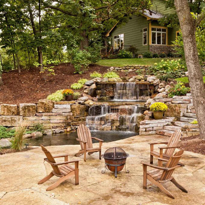 Terraced Hillside Landscaping, Steps with Retaining Wall, Create a Rock Garden, Hillside Water Feature, Front Yard Retaining Wall, Patio Overlook, Hillside Landscaping with Mulch, Tiered Raised Beds, Front Deck for a Sloped Yard, Prairie Garden Hillside Landscaping