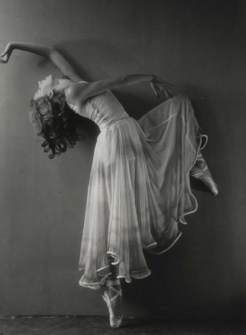 Elegance in Motion: Manon Chaufour by Martin Imboden Royal Dining with Angela Lansbury and Basil Rathbone, Breaking Barriers: Mary Wallace’s Historic Drive, Strength and Heritage in Canyon De Chelly, Portrait of Youth: Kiowa Girl, Berber Beauty: Ouled Nail Girl, A Shared Moment: Paula and Her Kitten, Marilyn Monroe’s Playful Potato Sack Look, Challenging the Rules: Brooklyn Dress Code Protest, 1940, Wolof Family Portrait by Emile Noal, Reunion After a Long Voyage, Elegance in Motion: Manon Chaufour by Martin Imboden, Dad’s Got Moves: Melbourne, 1940s, Fire Escape Embrace, 1946, Ani Chokyi of Tibet, Captured in Darjeeling, 1890s, Headlines and Daydreams, Champs Elysées, 1947, Timeless Athens: The Acropolis in 1860, Catharina ‘Toto’ Koopman: A Parisian Muse, 1933, On the Road Together: Family Hitchhiking, California, Einstein and His Beloved Violin, 1941, Edmund Kesting’s Play with Light and Shadow, 1930, Champagne Inspector in Protective Mask, Helen Bennett’s Stunning Spider Dress, 1939, Harriet Hoctor’s Graceful Question Mark, 1925, Double the Dazzle: The Dolly Sisters in the 1920s, Glamour at The Forbidden City, 1948, Double the Glamour: Mother-Daughter Style, 1954, Cardboard Couture: Sicilian Suit Substitute, The Day Daddy Came Home: Hector Murdoch’s Return, Courage Behind Bars: Mexico, 1935, Milk Time Mischief at Arch Badertscher’s Farm