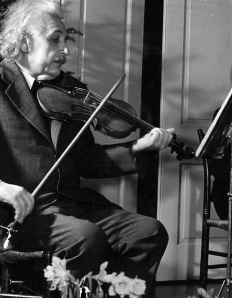 Einstein and His Beloved Violin, 1941 Royal Dining with Angela Lansbury and Basil Rathbone, Breaking Barriers: Mary Wallace’s Historic Drive, Strength and Heritage in Canyon De Chelly, Portrait of Youth: Kiowa Girl, Berber Beauty: Ouled Nail Girl, A Shared Moment: Paula and Her Kitten, Marilyn Monroe’s Playful Potato Sack Look, Challenging the Rules: Brooklyn Dress Code Protest, 1940, Wolof Family Portrait by Emile Noal, Reunion After a Long Voyage, Elegance in Motion: Manon Chaufour by Martin Imboden, Dad’s Got Moves: Melbourne, 1940s, Fire Escape Embrace, 1946, Ani Chokyi of Tibet, Captured in Darjeeling, 1890s, Headlines and Daydreams, Champs Elysées, 1947, Timeless Athens: The Acropolis in 1860, Catharina ‘Toto’ Koopman: A Parisian Muse, 1933, On the Road Together: Family Hitchhiking, California, Einstein and His Beloved Violin, 1941, Edmund Kesting’s Play with Light and Shadow, 1930, Champagne Inspector in Protective Mask, Helen Bennett’s Stunning Spider Dress, 1939, Harriet Hoctor’s Graceful Question Mark, 1925, Double the Dazzle: The Dolly Sisters in the 1920s, Glamour at The Forbidden City, 1948, Double the Glamour: Mother-Daughter Style, 1954, Cardboard Couture: Sicilian Suit Substitute, The Day Daddy Came Home: Hector Murdoch’s Return, Courage Behind Bars: Mexico, 1935, Milk Time Mischief at Arch Badertscher’s Farm