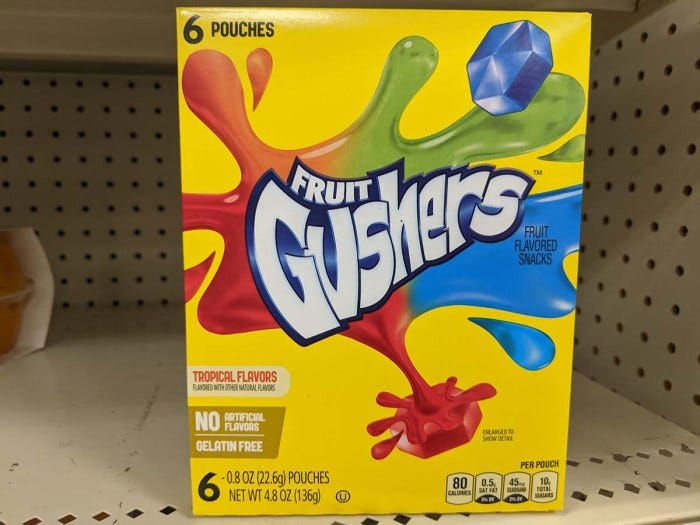 #18: Gushers (late ’80s) #1: Twinkies, #3: Hostess CupCakes, #4: Fruit Roll-Ups, #6: Little Debbie Swiss Rolls, #7: Pudding Cups (Hunt’s or Snack Pack), #9: Peanut Butter and Jelly Sandwich (cut in triangles, what else?), #10: Handi-Snacks (the ones with the red plastic cheese spreader), #12: Marshmallow Pies (Moon Pies), #13: Apple Newtons / Fig Newtons, #15: Planters Cheez Balls (in mini canisters), #16: Zingers, #18: Gushers (late ’80s), #19: Pop-Tarts (in foil wrapper), #21: Capri Sun Pouches, #22: Chewy Granola Bars (Quaker), #24: Chex Mix or Homemade Trail Mix, #25: Butter Cookies (in wax paper), #27: Toaster Pastries (different off-brand Pop-Tarts), #28: Cookies from the School Cafeteria
