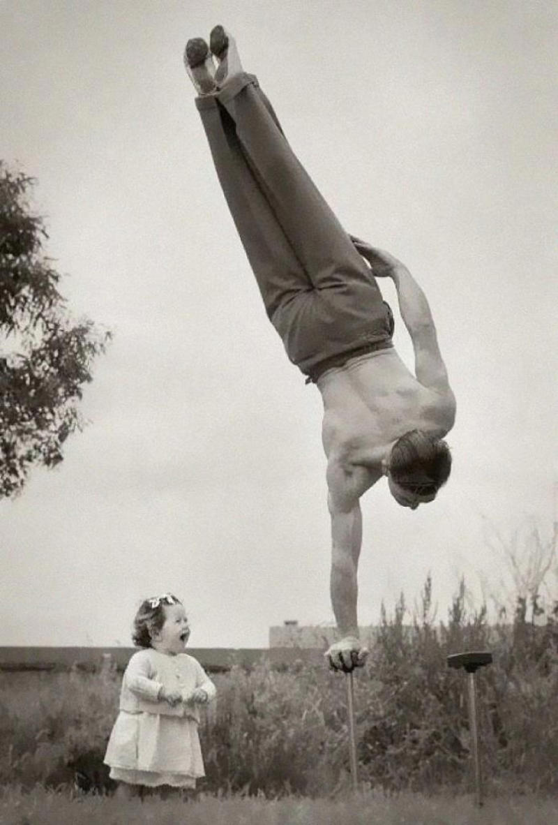 Dad’s Got Moves: Melbourne, 1940s Royal Dining with Angela Lansbury and Basil Rathbone, Breaking Barriers: Mary Wallace’s Historic Drive, Strength and Heritage in Canyon De Chelly, Portrait of Youth: Kiowa Girl, Berber Beauty: Ouled Nail Girl, A Shared Moment: Paula and Her Kitten, Marilyn Monroe’s Playful Potato Sack Look, Challenging the Rules: Brooklyn Dress Code Protest, 1940, Wolof Family Portrait by Emile Noal, Reunion After a Long Voyage, Elegance in Motion: Manon Chaufour by Martin Imboden, Dad’s Got Moves: Melbourne, 1940s, Fire Escape Embrace, 1946, Ani Chokyi of Tibet, Captured in Darjeeling, 1890s, Headlines and Daydreams, Champs Elysées, 1947, Timeless Athens: The Acropolis in 1860, Catharina ‘Toto’ Koopman: A Parisian Muse, 1933, On the Road Together: Family Hitchhiking, California, Einstein and His Beloved Violin, 1941, Edmund Kesting’s Play with Light and Shadow, 1930, Champagne Inspector in Protective Mask, Helen Bennett’s Stunning Spider Dress, 1939, Harriet Hoctor’s Graceful Question Mark, 1925, Double the Dazzle: The Dolly Sisters in the 1920s, Glamour at The Forbidden City, 1948, Double the Glamour: Mother-Daughter Style, 1954, Cardboard Couture: Sicilian Suit Substitute, The Day Daddy Came Home: Hector Murdoch’s Return, Courage Behind Bars: Mexico, 1935, Milk Time Mischief at Arch Badertscher’s Farm