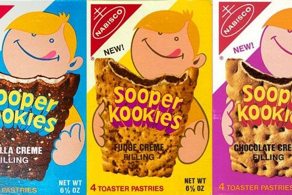 #27: Toaster Pastries (different off-brand Pop-Tarts) #1: Twinkies, #3: Hostess CupCakes, #4: Fruit Roll-Ups, #6: Little Debbie Swiss Rolls, #7: Pudding Cups (Hunt’s or Snack Pack), #9: Peanut Butter and Jelly Sandwich (cut in triangles, what else?), #10: Handi-Snacks (the ones with the red plastic cheese spreader), #12: Marshmallow Pies (Moon Pies), #13: Apple Newtons / Fig Newtons, #15: Planters Cheez Balls (in mini canisters), #16: Zingers, #18: Gushers (late ’80s), #19: Pop-Tarts (in foil wrapper), #21: Capri Sun Pouches, #22: Chewy Granola Bars (Quaker), #24: Chex Mix or Homemade Trail Mix, #25: Butter Cookies (in wax paper), #27: Toaster Pastries (different off-brand Pop-Tarts), #28: Cookies from the School Cafeteria