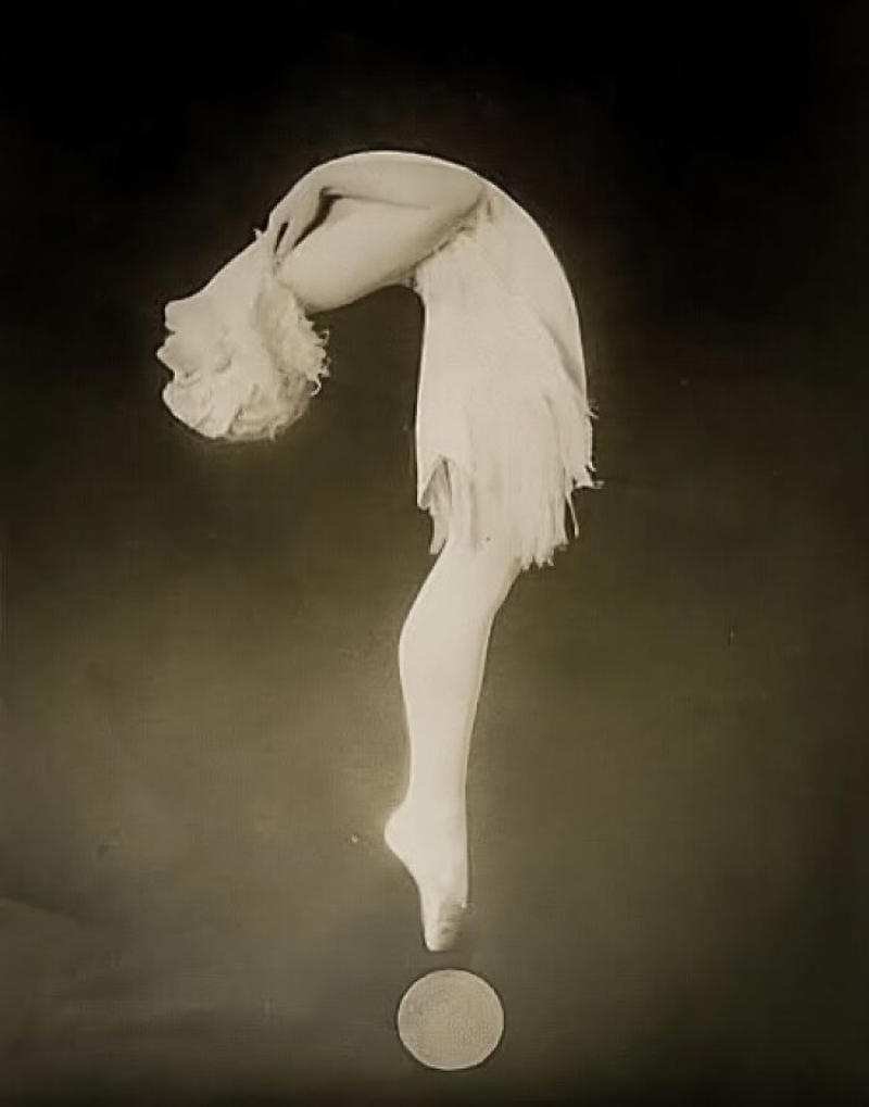 Harriet Hoctor’s Graceful Question Mark, 1925 Royal Dining with Angela Lansbury and Basil Rathbone, Breaking Barriers: Mary Wallace’s Historic Drive, Strength and Heritage in Canyon De Chelly, Portrait of Youth: Kiowa Girl, Berber Beauty: Ouled Nail Girl, A Shared Moment: Paula and Her Kitten, Marilyn Monroe’s Playful Potato Sack Look, Challenging the Rules: Brooklyn Dress Code Protest, 1940, Wolof Family Portrait by Emile Noal, Reunion After a Long Voyage, Elegance in Motion: Manon Chaufour by Martin Imboden, Dad’s Got Moves: Melbourne, 1940s, Fire Escape Embrace, 1946, Ani Chokyi of Tibet, Captured in Darjeeling, 1890s, Headlines and Daydreams, Champs Elysées, 1947, Timeless Athens: The Acropolis in 1860, Catharina ‘Toto’ Koopman: A Parisian Muse, 1933, On the Road Together: Family Hitchhiking, California, Einstein and His Beloved Violin, 1941, Edmund Kesting’s Play with Light and Shadow, 1930, Champagne Inspector in Protective Mask, Helen Bennett’s Stunning Spider Dress, 1939, Harriet Hoctor’s Graceful Question Mark, 1925, Double the Dazzle: The Dolly Sisters in the 1920s, Glamour at The Forbidden City, 1948, Double the Glamour: Mother-Daughter Style, 1954, Cardboard Couture: Sicilian Suit Substitute, The Day Daddy Came Home: Hector Murdoch’s Return, Courage Behind Bars: Mexico, 1935, Milk Time Mischief at Arch Badertscher’s Farm