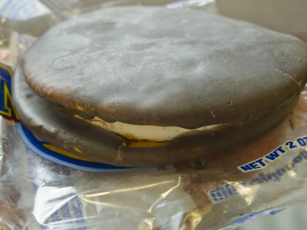 #12: Marshmallow Pies (Moon Pies) #1: Twinkies, #3: Hostess CupCakes, #4: Fruit Roll-Ups, #6: Little Debbie Swiss Rolls, #7: Pudding Cups (Hunt’s or Snack Pack), #9: Peanut Butter and Jelly Sandwich (cut in triangles, what else?), #10: Handi-Snacks (the ones with the red plastic cheese spreader), #12: Marshmallow Pies (Moon Pies), #13: Apple Newtons / Fig Newtons, #15: Planters Cheez Balls (in mini canisters), #16: Zingers, #18: Gushers (late ’80s), #19: Pop-Tarts (in foil wrapper), #21: Capri Sun Pouches, #22: Chewy Granola Bars (Quaker), #24: Chex Mix or Homemade Trail Mix, #25: Butter Cookies (in wax paper), #27: Toaster Pastries (different off-brand Pop-Tarts), #28: Cookies from the School Cafeteria