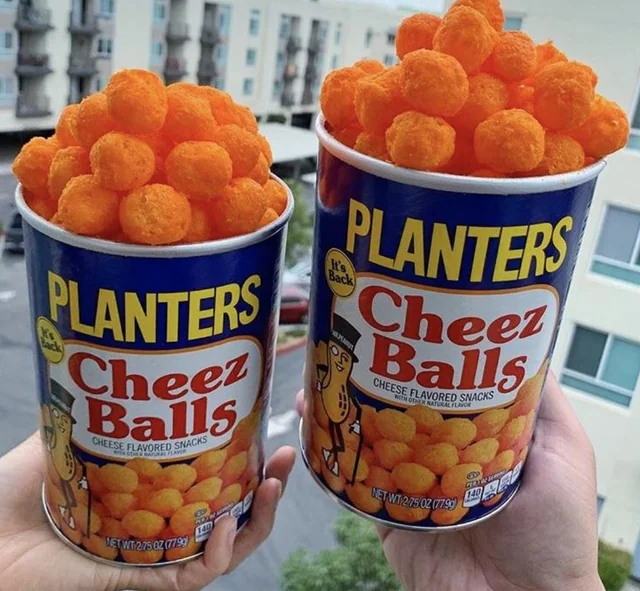 #15: Planters Cheez Balls (in mini canisters) #1: Twinkies, #3: Hostess CupCakes, #4: Fruit Roll-Ups, #6: Little Debbie Swiss Rolls, #7: Pudding Cups (Hunt’s or Snack Pack), #9: Peanut Butter and Jelly Sandwich (cut in triangles, what else?), #10: Handi-Snacks (the ones with the red plastic cheese spreader), #12: Marshmallow Pies (Moon Pies), #13: Apple Newtons / Fig Newtons, #15: Planters Cheez Balls (in mini canisters), #16: Zingers, #18: Gushers (late ’80s), #19: Pop-Tarts (in foil wrapper), #21: Capri Sun Pouches, #22: Chewy Granola Bars (Quaker), #24: Chex Mix or Homemade Trail Mix, #25: Butter Cookies (in wax paper), #27: Toaster Pastries (different off-brand Pop-Tarts), #28: Cookies from the School Cafeteria