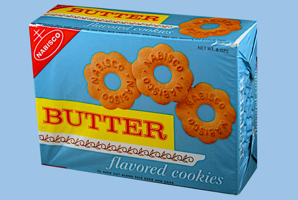 #25: Butter Cookies (in wax paper) #1: Twinkies, #3: Hostess CupCakes, #4: Fruit Roll-Ups, #6: Little Debbie Swiss Rolls, #7: Pudding Cups (Hunt’s or Snack Pack), #9: Peanut Butter and Jelly Sandwich (cut in triangles, what else?), #10: Handi-Snacks (the ones with the red plastic cheese spreader), #12: Marshmallow Pies (Moon Pies), #13: Apple Newtons / Fig Newtons, #15: Planters Cheez Balls (in mini canisters), #16: Zingers, #18: Gushers (late ’80s), #19: Pop-Tarts (in foil wrapper), #21: Capri Sun Pouches, #22: Chewy Granola Bars (Quaker), #24: Chex Mix or Homemade Trail Mix, #25: Butter Cookies (in wax paper), #27: Toaster Pastries (different off-brand Pop-Tarts), #28: Cookies from the School Cafeteria