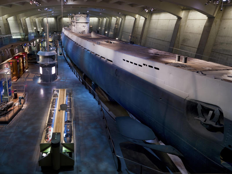 At 252 feet long, the U-505 is nearly as long as a city block. It is also 31 feet and 6 inches tall. Bullet holes can be seen all over the conning tower., The first stop on my tour was the petty officer's quarters., When the U-505 was on patrol, it carried 12 tons of food., The crew had to navigate various challenges while underwater, including high temperatures., All calculations before firing a torpedo were done with pen and paper., The US Navy captured the U-505 on June 4, 1944., To prevent the U-505's capture, the Germans tried one last trick., On September 2, 1954, the submarine was hauled across Lake Shore Drive in Chicago., At first, the submarine was displayed outside the museum.
