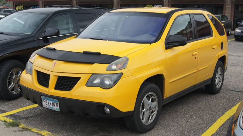 1. Jeep Wrangler (JK), 2. Toyota FJ Cruiser, 3. Ford Explorer (Early 2000s), 4. Suzuki Samurai, 5. Land Rover Defender 90 (Old Gen), 6. Chevrolet Suburban (Pre-2000s), 7. Mitsubishi Montero, 8. Mercedes-Benz G-Class (Pre-2018), 9. Chevrolet Astro Van, 10. Dodge Durango (First Generation), 11. Toyota Land Cruiser (80 Series), 12. Kia Sedona (2000s Models), 13. Nissan Xterra (First Generation), 14. GMC Yukon XL (Early 2000s), 15. Isuzu Trooper, 16. Ford Aerostar, 17. Chrysler Pacifica (First Generation), 18. Hummer H2, 19. Buick Rendezvous, 20. Pontiac Aztek