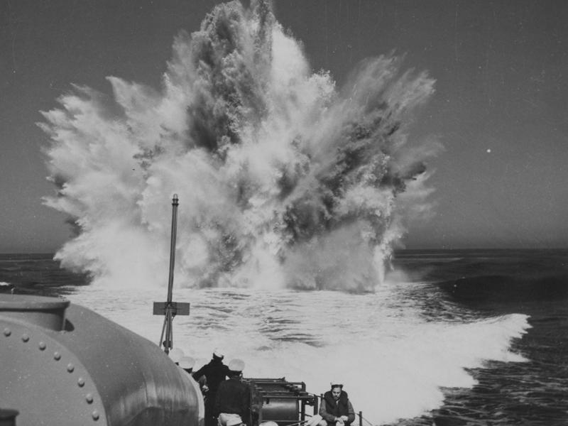 Then, a depth charge hit the submarine, spinning it closer to crash depth. Bullet holes can be seen all over the conning tower., The first stop on my tour was the petty officer's quarters., When the U-505 was on patrol, it carried 12 tons of food., The crew had to navigate various challenges while underwater, including high temperatures., All calculations before firing a torpedo were done with pen and paper., The US Navy captured the U-505 on June 4, 1944., To prevent the U-505's capture, the Germans tried one last trick., On September 2, 1954, the submarine was hauled across Lake Shore Drive in Chicago., At first, the submarine was displayed outside the museum.