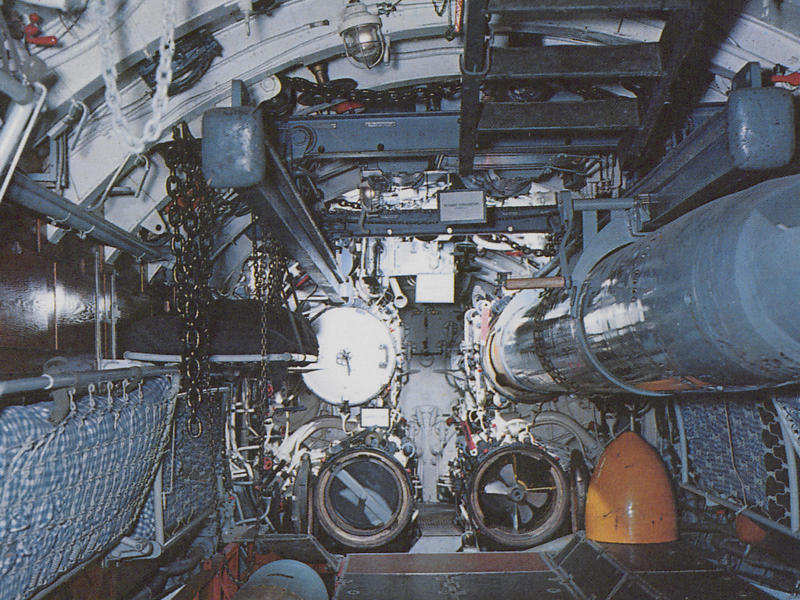 The submarine had four 21-inch torpedo tubes in the bow and two in the stern. Bullet holes can be seen all over the conning tower., The first stop on my tour was the petty officer's quarters., When the U-505 was on patrol, it carried 12 tons of food., The crew had to navigate various challenges while underwater, including high temperatures., All calculations before firing a torpedo were done with pen and paper., The US Navy captured the U-505 on June 4, 1944., To prevent the U-505's capture, the Germans tried one last trick., On September 2, 1954, the submarine was hauled across Lake Shore Drive in Chicago., At first, the submarine was displayed outside the museum.