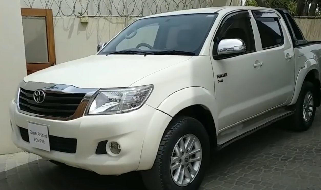 Whichever Way You Go, There’s A Trade-Off, Its Entry Price Under K Is A Budget Standout, It Comes With Three Engine Options For Every Type Of Driver, The Champ Was Built On Toyota’s Proven IMV Platform, The Bolt-On Body System Enables DIY Configurations, The Champ Is Offered In Two Wheelbase Lengths, It Gets To Work With A 1-Ton Payload, Toyota Gazoo Racing Built A Track Version, Champs’s Optional Diesel Engine Gets Automatic Transmission, The Camper Versions Feature Solar And Hot Water, The Truck Has A Short Turning Radius, The Champ’s Fuel Economy Beats Most US Trucks, The Champ Has Manual Crank Windows And No Infotainment, The Truck Has Basic Safety Features, The Interior Is Designed For Utility, Not Luxury, No US Release Due To Safety And Emissions, Its Flat Deck Comes Standard On The Entry Model, This Model's AC Is Optional, Not Standard, The Trucks’s Custom Add-Ons Often Fall Outside Toyota Support, All Champ Models Use Steel Wheels, It Has Limited Theft Protection Features, The Champ’s Leaf-Spring Suspension Limits Comfort, The Paint And Trim Options Are Minimal