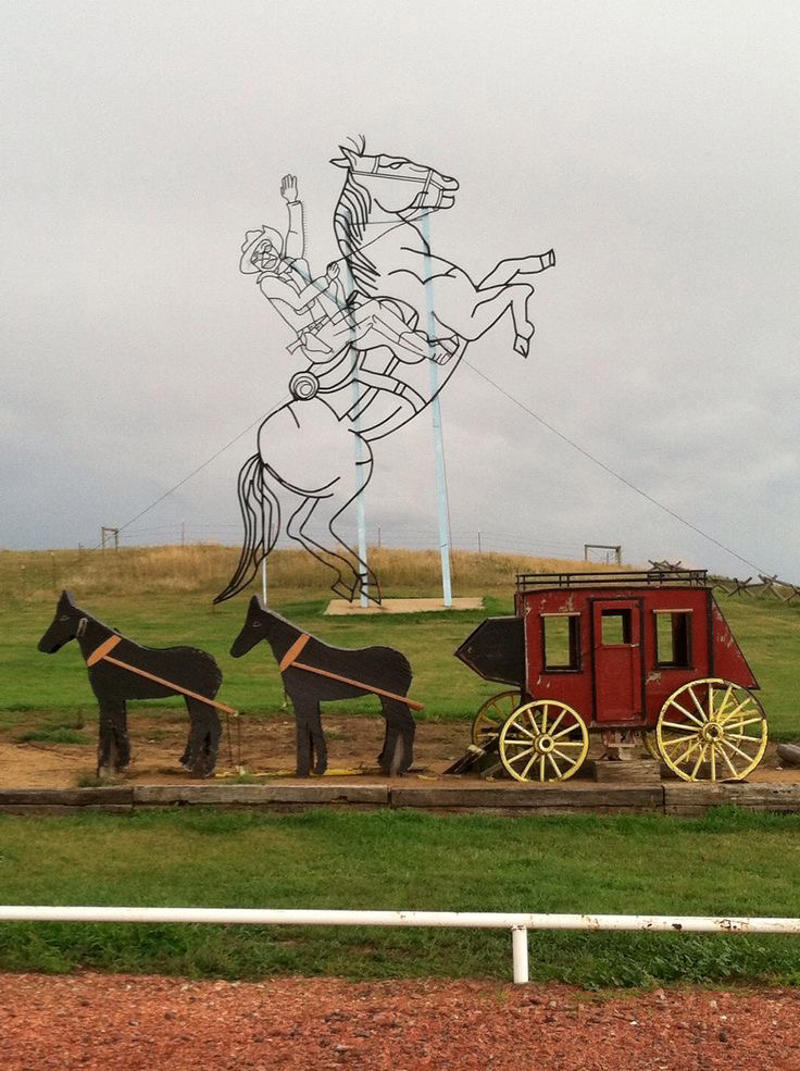 Enchanted Highway – North Dakota, USA Desert of Maine – Maine, USA, Bourbon Street – Louisiana, USA, 50,000 Silver Dollar Bar – Montana, USA, Graceland – Tennessee, USA, Mystery Spot – Michigan, USA, Frontier Prison - Wyoming, USA, Times Square – New York, USA, Hollywood Walk of Fame – California, USA, Wall Drug – South Dakota, USA, Enchanted Highway – North Dakota, USA, Ark Encounter – Kentucky, USA, The Blowing Rock – North Carolina, USA, Crater of Diamonds – Arkansas, USA, EPCOT – Florida, USA, World of Coca‑Cola – Georgia, USA, Waikiki Beach – Hawaii, USA, Craters of the Moon – Idaho, USA, World’s Largest Ball of Twine – Kansas, USA