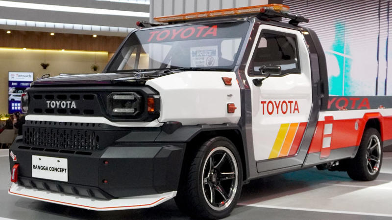 The Champ Was Built On Toyota’s Proven IMV Platform Whichever Way You Go, There’s A Trade-Off, Its Entry Price Under K Is A Budget Standout, It Comes With Three Engine Options For Every Type Of Driver, The Champ Was Built On Toyota’s Proven IMV Platform, The Bolt-On Body System Enables DIY Configurations, The Champ Is Offered In Two Wheelbase Lengths, It Gets To Work With A 1-Ton Payload, Toyota Gazoo Racing Built A Track Version, Champs’s Optional Diesel Engine Gets Automatic Transmission, The Camper Versions Feature Solar And Hot Water, The Truck Has A Short Turning Radius, The Champ’s Fuel Economy Beats Most US Trucks, The Champ Has Manual Crank Windows And No Infotainment, The Truck Has Basic Safety Features, The Interior Is Designed For Utility, Not Luxury, No US Release Due To Safety And Emissions, Its Flat Deck Comes Standard On The Entry Model, This Model's AC Is Optional, Not Standard, The Trucks’s Custom Add-Ons Often Fall Outside Toyota Support, All Champ Models Use Steel Wheels, It Has Limited Theft Protection Features, The Champ’s Leaf-Spring Suspension Limits Comfort, The Paint And Trim Options Are Minimal
