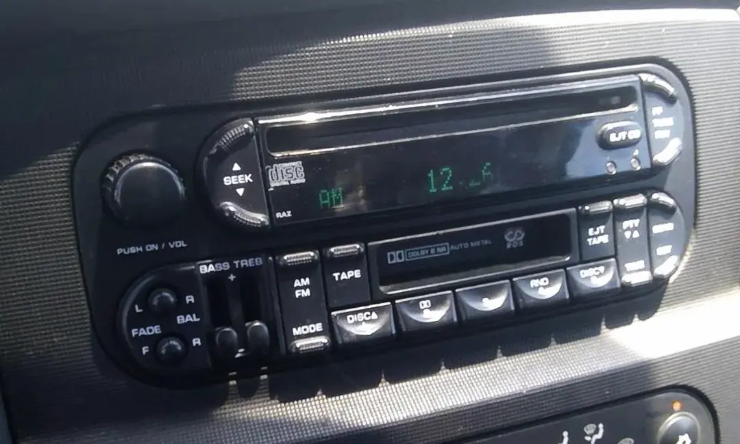 1. Automatic Seat Belts, 2. Car Phones, 3. Pop-Up Headlights, 4. Cigarette Lighters and Ashtrays, 5. Bench Front Seats, 6. Manual Window Cranks, 7. Tape Decks and CD Players, 8. Hood Ornaments, 9. Hidden Gas Caps Behind License Plates