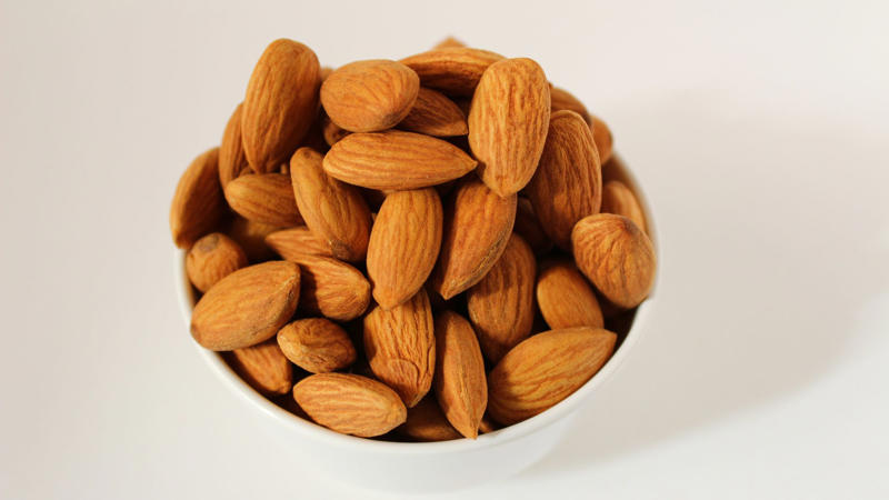 4. Almonds 1. Avocados, 2. Berries, 3. Quinoa, 4. Almonds, 5. Spinach, 6. Salmon, 7. Sweet Potatoes, 8. Garlic, 9. Broccoli, 10. Chia Seeds, 11. Brussels Sprouts, 12. Eggs, 13. Apples, 14. Walnuts, 15. Asparagus, 16. Oats, 17. Carrots, 18. Kale, 19. Oranges, 20. Bell Peppers