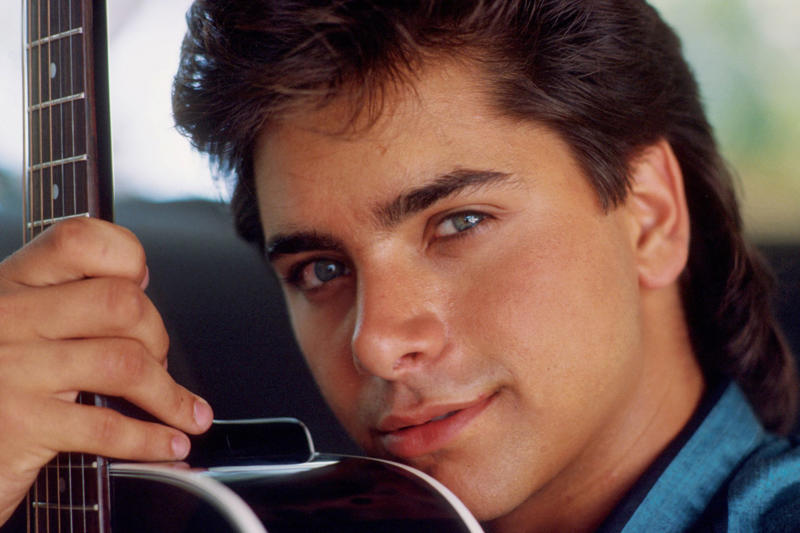 The golden age of family television From hospital idol to universal uncle, The golden age of family television, The perm as a cultural identity, The Stamos effect on nineties masculinity, The return of Uncle Jesse, Stamos off the set, The uncle who doesn’t age (at least publicly), Intergenerational pop icon, The cool uncle as an archetype