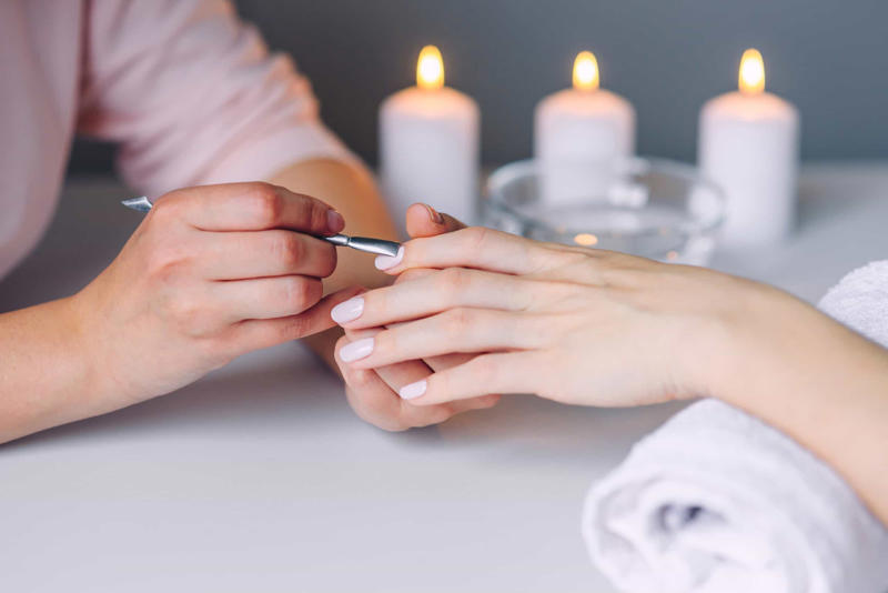 Get a manicure Touching our faces, Licking our lips, Rubbing our eyes, Popping pimples, Using rubber bands, Using heat, Overwashing our hair, Not washing pillow cases, Biting our nails, Cover your nails, Distract yourself, Get a manicure, Eat well, Keep nails short, Apply cream