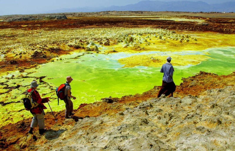 15. Danakil Desert, Ethiopia 19. Lake Natron, Tanzania, 18. Frying Pan Lake, New Zealand, 17. Table Mountain, South Africa, 16. Trolltunga, Norway, 15. Danakil Desert, Ethiopia, 14. Blue Mountains National Park, New South Wales, Australia, 13. El Caminito del Rey, Spain, 12. Great Blue Hole, Belize, 11. Mount Etna, Italy, 10. Hot Springs, Yellowstone National Park, Wyoming, USA, 9. The Eiger, Switzerland, 8. Bolton Strid, England, UK, 7. The Bay of Fundy, Nova Scotia and New Brunswick, Canada, 6. Ben Nevis, Scotland, UK, 5. Half Dome, Yosemite National Park, California, USA, 4. Mount Fuji, Japan, 3. Cliffs of Moher, Ireland, 2. Mount Everest, Nepal