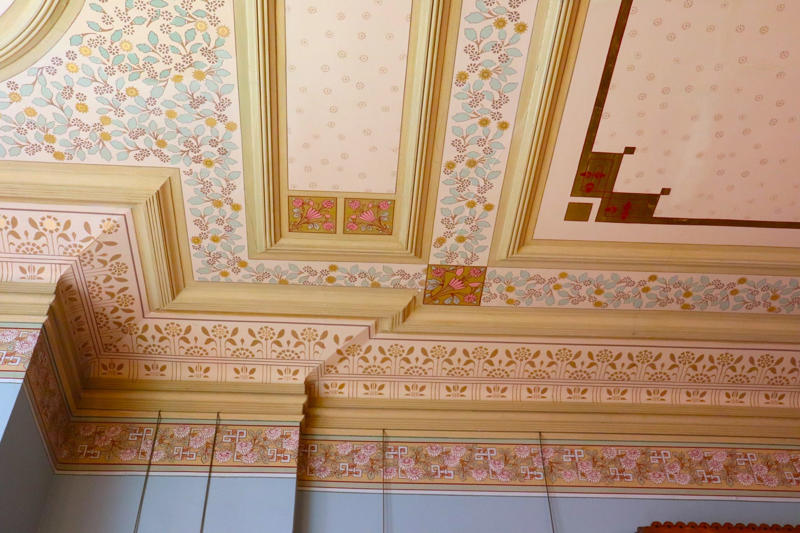 The ceiling was decorated with more feminine floral patterns than the Ebony Library.