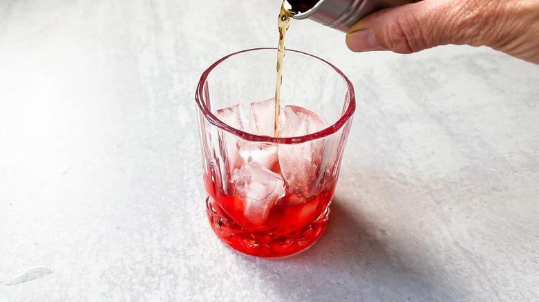 Gather The Classic Americano Cocktail Ingredients, Step 1: Cut An Orange Slice For Garnish, Step 2: Make An Orange Twist, Step 3: Add Ice To A Rocks Glass, Step 4: Add The Campari, Step 5: Follow Up With The Vermouth, Step 6: Top Off With The Club Soda, Step 7: Add An Orange Garnish And Serve, Pairs Well With Classic Americano Cocktails, Classic Americano Cocktail Recipe, What Is The History Of The Negroni And Americano Cocktails?, Read More Recipes