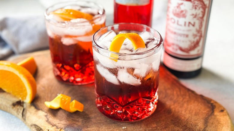 Gather The Classic Americano Cocktail Ingredients, Step 1: Cut An Orange Slice For Garnish, Step 2: Make An Orange Twist, Step 3: Add Ice To A Rocks Glass, Step 4: Add The Campari, Step 5: Follow Up With The Vermouth, Step 6: Top Off With The Club Soda, Step 7: Add An Orange Garnish And Serve, Pairs Well With Classic Americano Cocktails, Classic Americano Cocktail Recipe, What Is The History Of The Negroni And Americano Cocktails?, Read More Recipes