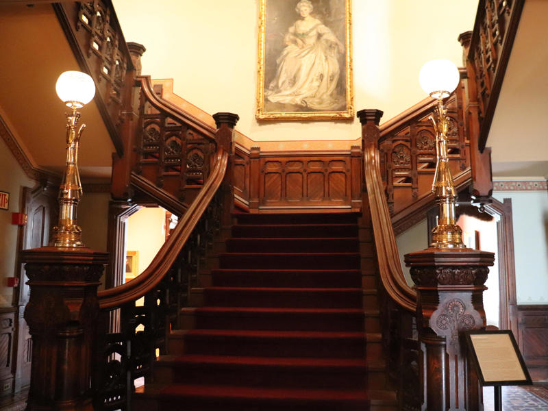 The Great Hall also featured a grand staircase with the only two remaining original light fixtures in the home.