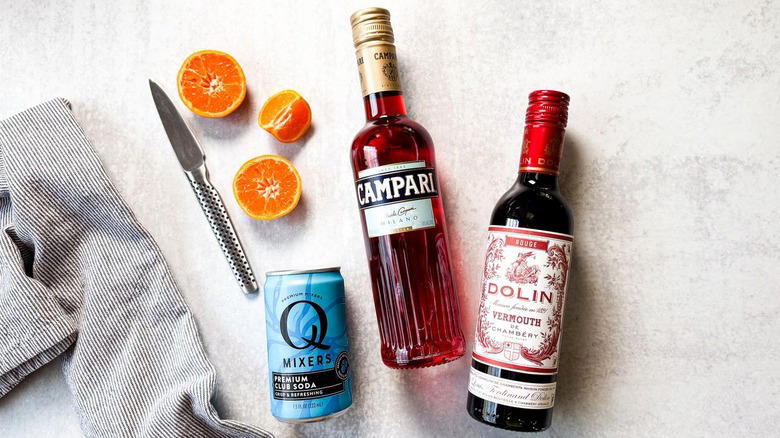Gather The Classic Americano Cocktail Ingredients, Step 1: Cut An Orange Slice For Garnish, Step 2: Make An Orange Twist, Step 3: Add Ice To A Rocks Glass, Step 4: Add The Campari, Step 5: Follow Up With The Vermouth, Step 6: Top Off With The Club Soda, Step 7: Add An Orange Garnish And Serve, Pairs Well With Classic Americano Cocktails, Classic Americano Cocktail Recipe, What Is The History Of The Negroni And Americano Cocktails?, Read More Recipes