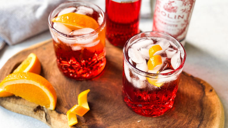 Gather The Classic Americano Cocktail Ingredients, Step 1: Cut An Orange Slice For Garnish, Step 2: Make An Orange Twist, Step 3: Add Ice To A Rocks Glass, Step 4: Add The Campari, Step 5: Follow Up With The Vermouth, Step 6: Top Off With The Club Soda, Step 7: Add An Orange Garnish And Serve, Pairs Well With Classic Americano Cocktails, Classic Americano Cocktail Recipe, What Is The History Of The Negroni And Americano Cocktails?, Read More Recipes