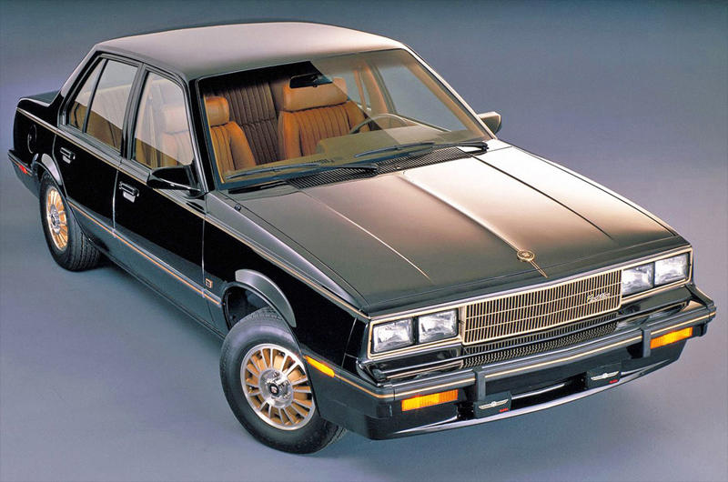 Cadillac Cimarron (1982) Wars, high fuel prices and rampant inflation., Subaru BRAT (1977), Plymouth Sapporo (1978), Midas Bronze (1978), Alfa Romeo Alfa 6 (1979), Buick Century Turbo Coupe (1979), Stevens Cipher (1980), Chevrolet Citation X-11 (1980), Dodge Mirada (1980), AMC Eagle Kammback (1981), Jeep CJ-8 (1981), Ford EXP (1982), Lincoln Continental Turbodiesel (1983), Isuzu Impulse (1983), Marcos Mantula (1983), Zimmer Quicksilver (1984), UMM Alter (1984), Pontiac Sunbird (1984), Chrysler Laser (1984), Dodge Omni GLH (1984), MVS Venturi (1984), Pontiac Fiero (1984), CXA CX (1985), Volvo 780 (1985), Naylor TF (1985), Merkur XR4Ti (1985), Daihatsu Cuore Avanzato TR-XX R4 (1985), UVA F33 (1986), Suzuki Samurai (1986), BMW Z1 (1988), Chevrolet Beretta GTU (1988), Buick Reatta (1988), Daihatsu Rocky (1988), Chrysler TC by Maserati (1988), Lexus ES (first generation,1989), Bertone Freeclimber (1989), LaForza 5-litre (1989), Dodge Dakota Sport Convertible (1989), Vegantune Evante Mk2 (1990), Cadillac Cimarron (1982)