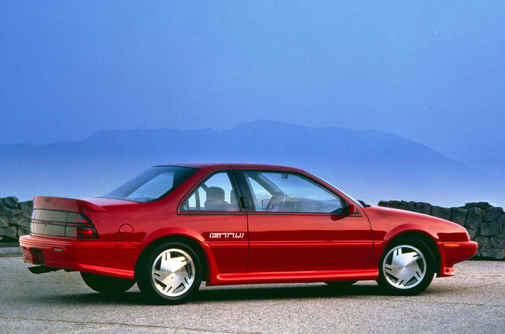 Chevrolet Beretta GTU (1988) Wars, high fuel prices and rampant inflation., Subaru BRAT (1977), Plymouth Sapporo (1978), Midas Bronze (1978), Alfa Romeo Alfa 6 (1979), Buick Century Turbo Coupe (1979), Stevens Cipher (1980), Chevrolet Citation X-11 (1980), Dodge Mirada (1980), AMC Eagle Kammback (1981), Jeep CJ-8 (1981), Ford EXP (1982), Lincoln Continental Turbodiesel (1983), Isuzu Impulse (1983), Marcos Mantula (1983), Zimmer Quicksilver (1984), UMM Alter (1984), Pontiac Sunbird (1984), Chrysler Laser (1984), Dodge Omni GLH (1984), MVS Venturi (1984), Pontiac Fiero (1984), CXA CX (1985), Volvo 780 (1985), Naylor TF (1985), Merkur XR4Ti (1985), Daihatsu Cuore Avanzato TR-XX R4 (1985), UVA F33 (1986), Suzuki Samurai (1986), BMW Z1 (1988), Chevrolet Beretta GTU (1988), Buick Reatta (1988), Daihatsu Rocky (1988), Chrysler TC by Maserati (1988), Lexus ES (first generation,1989), Bertone Freeclimber (1989), LaForza 5-litre (1989), Dodge Dakota Sport Convertible (1989), Vegantune Evante Mk2 (1990), Cadillac Cimarron (1982)
