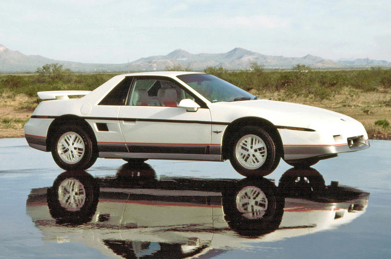 Pontiac Fiero (1984) Wars, high fuel prices and rampant inflation., Subaru Brat (1977), Plymouth Sapporo (1978), Midas Bronze (1978), Alfa Romeo Alfa 6 (1979), Buick Century Turbo Coupe (1979), Stevens Cipher (1980), Chevrolet Citation X-11 (1980), Dodge Mirada (1980), AMC Eagle Kammback (1981), Jeep CJ-8 (1981), Ford EXP (1982), Lincoln Continental Turbodiesel (1983), Isuzu Impulse (1983), Marcos Mantula (1983), Zimmer Quicksilver (1984), UMM Alter (1984), Pontiac Sunbird (1984), Chrysler Laser (1984), Dodge Omni GLH (1984), MVS Venturi (1984), Pontiac Fiero (1984), CXA CX (1985), Volvo 780 (1985), Naylor TF (1985), Merkur XR4Ti (1985), Daihatsu Cuore Avanzato TR-XX R4 (1985), UVA F33 (1986), Suzuki Samurai (1986), Vegantune Evante (1987), BMW Z1 (1988), Chevrolet Beretta GTU (1988), Buick Reatta (1988), Daihatsu Rocky (1988), Chrysler TC by Maserati (1988), Lexus ES (first generation,1989), Bertone Freeclimber (1989), LaForza 5-liter (1989), Dodge Dakota Sport Convertible (1989), Cadillac Cimarron (1982)