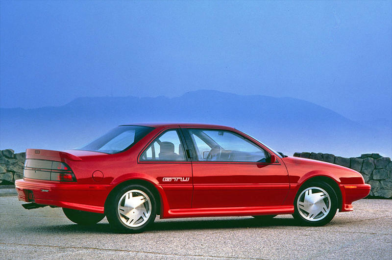 Wars, high fuel prices and rampant inflation. Wars, high fuel prices and rampant inflation., Subaru BRAT (1977), Plymouth Sapporo (1978), Midas Bronze (1978), Alfa Romeo Alfa 6 (1979), Buick Century Turbo Coupe (1979), Stevens Cipher (1980), Chevrolet Citation X-11 (1980), Dodge Mirada (1980), AMC Eagle Kammback (1981), Jeep CJ-8 (1981), Ford EXP (1982), Lincoln Continental Turbodiesel (1983), Isuzu Impulse (1983), Marcos Mantula (1983), Zimmer Quicksilver (1984), UMM Alter (1984), Pontiac Sunbird (1984), Chrysler Laser (1984), Dodge Omni GLH (1984), MVS Venturi (1984), Pontiac Fiero (1984), CXA CX (1985), Volvo 780 (1985), Naylor TF (1985), Merkur XR4Ti (1985), Daihatsu Cuore Avanzato TR-XX R4 (1985), UVA F33 (1986), Suzuki Samurai (1986), BMW Z1 (1988), Chevrolet Beretta GTU (1988), Buick Reatta (1988), Daihatsu Rocky (1988), Chrysler TC by Maserati (1988), Lexus ES (first generation,1989), Bertone Freeclimber (1989), LaForza 5-litre (1989), Dodge Dakota Sport Convertible (1989), Vegantune Evante Mk2 (1990), Cadillac Cimarron (1982)