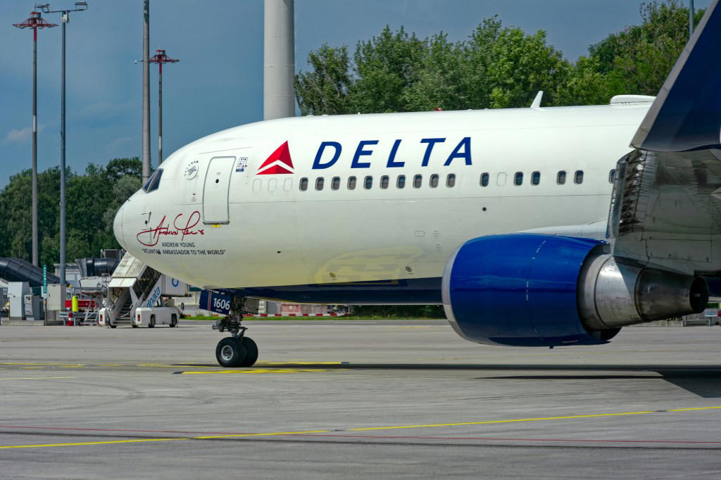 Engine of Boeing passenger plane bursts into flames during take-off