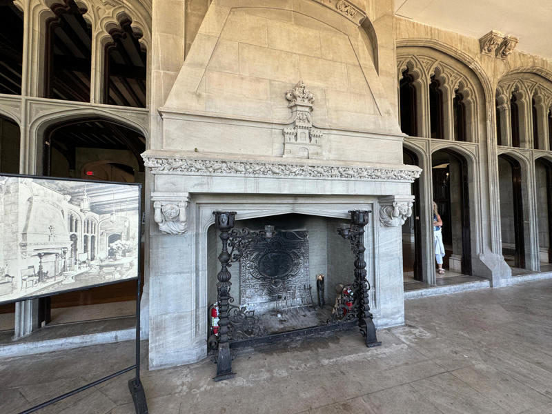 It also features the largest fireplace in the home. It also features the largest fireplace in the home., The billiards room also has a luxurious window seat., Directly next to the breakfast room was another wood-paneled study., It has yet another perfect window seat., It's also one of the only rooms with a private bathroom., We stopped at one more guest room, which was more modest., As the tour concluded, we were able to explore the gardens outside.