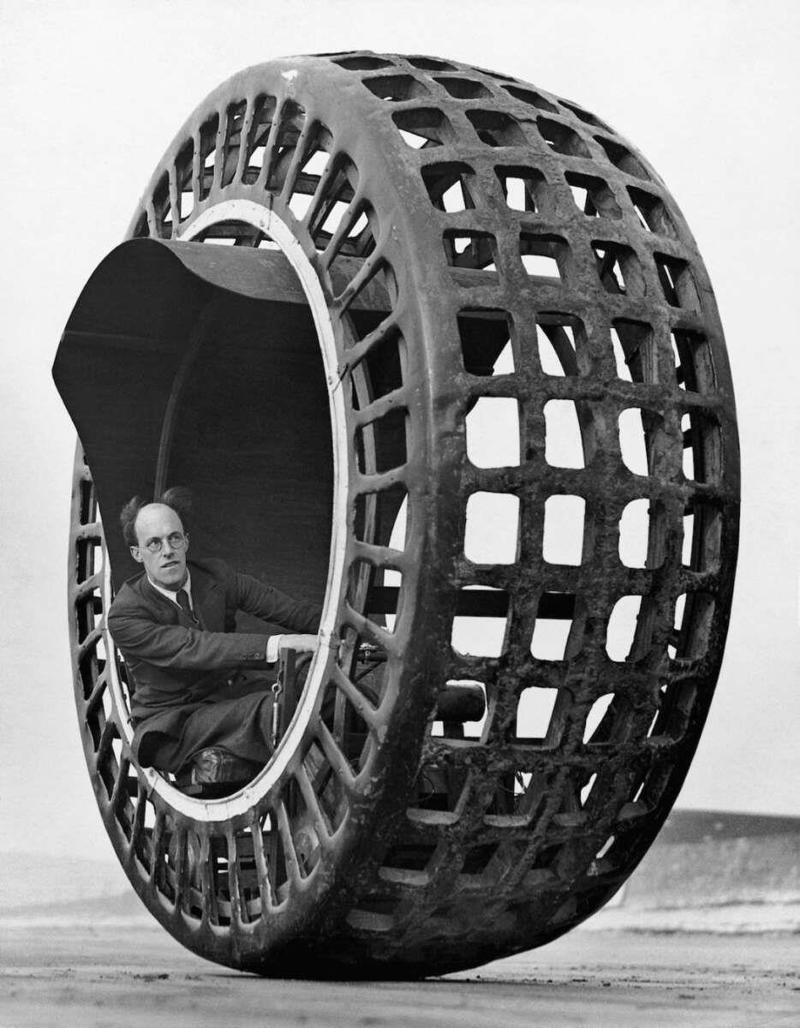 11. Driving a dynasphere, 1932 1. A World War Veteran, 1932, 2. Jean Bugatti standing next to his Bugatti Royale, one of the seven he built, 1932, 3. This milkmaid is trying to get the pig off the road, Norway, 1932, 4. Joan Crawford, 1932, 5. Just a young girl and her dog, 1932, 6. Taking a break after their tennis match, Washington DC, 1932, 7. Charles Ebbets shooting his famous photo, Lunch atop a Skyscraper, 1932, 8. Rocking the fur coats and a Cadillac in Harlem, 1932, 9. Painting the Eiffel Tower in 1932, 10. Sitting in peace in NYC, 1932, 11. Driving a dynasphere, 1932, 12. Harpo Marx and Amelia Earhart on the set of Horse Feathers, 1932, 13. Jacob Rheuben Ehrlich (8 ft 6 in) walking the Chicago streets with kids, 1932, 14. Sitting on a truck, playing her guitar in Amarillo, Texas, 1932, 15. A family portrait in Poland, 1932, 16. A colorized portrait of Amelia Earhart, 1932, 17. A woman bringing her pet cat to have a cup of tea, 18. Charles C. Ebbets snapping photos on a skyscraper, 1932, 19. Young Love, 1932, 20. Stan Laurel and Oliver Hardy taking a break from filming, 1932, 21. Fighting their way through the snow, 1932, 22. Taking an extremely unsafe nap, 1932, 23. Street fashion in Japan, 1932, 24. This is what packing for a camping trip looked like in 1932