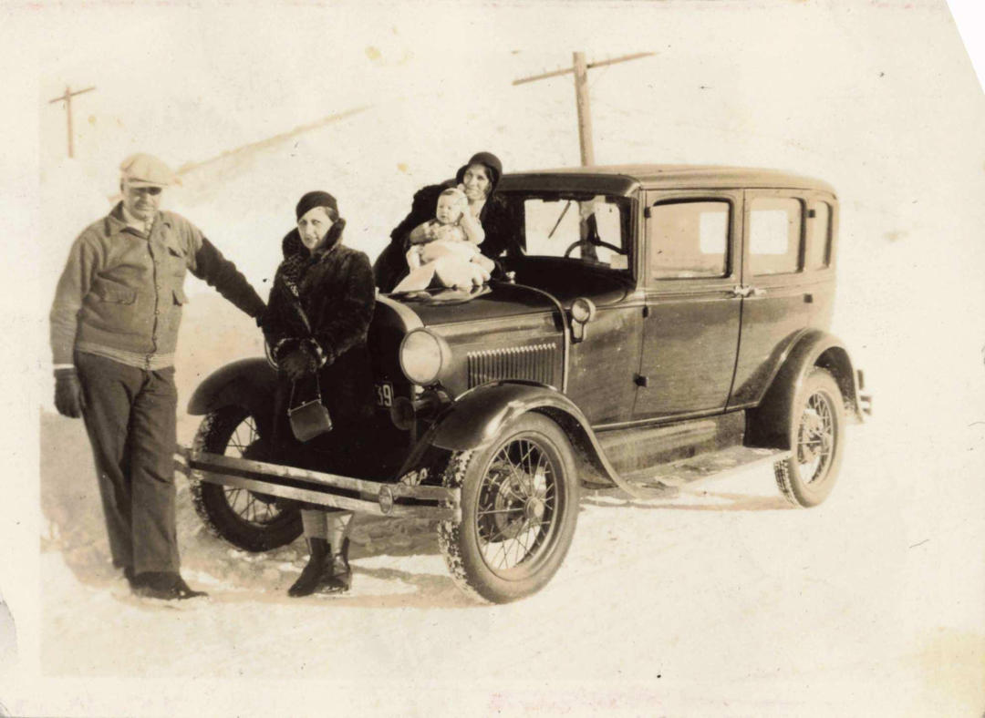 21. Fighting their way through the snow, 1932 1. A World War Veteran, 1932, 2. Jean Bugatti standing next to his Bugatti Royale, one of the seven he built, 1932, 3. This milkmaid is trying to get the pig off the road, Norway, 1932, 4. Joan Crawford, 1932, 5. Just a young girl and her dog, 1932, 6. Taking a break after their tennis match, Washington DC, 1932, 7. Charles Ebbets shooting his famous photo, Lunch atop a Skyscraper, 1932, 8. Rocking the fur coats and a Cadillac in Harlem, 1932, 9. Painting the Eiffel Tower in 1932, 10. Sitting in peace in NYC, 1932, 11. Driving a dynasphere, 1932, 12. Harpo Marx and Amelia Earhart on the set of Horse Feathers, 1932, 13. Jacob Rheuben Ehrlich (8 ft 6 in) walking the Chicago streets with kids, 1932, 14. Sitting on a truck, playing her guitar in Amarillo, Texas, 1932, 15. A family portrait in Poland, 1932, 16. A colorized portrait of Amelia Earhart, 1932, 17. A woman bringing her pet cat to have a cup of tea, 18. Charles C. Ebbets snapping photos on a skyscraper, 1932, 19. Young Love, 1932, 20. Stan Laurel and Oliver Hardy taking a break from filming, 1932, 21. Fighting their way through the snow, 1932, 22. Taking an extremely unsafe nap, 1932, 23. Street fashion in Japan, 1932, 24. This is what packing for a camping trip looked like in 1932