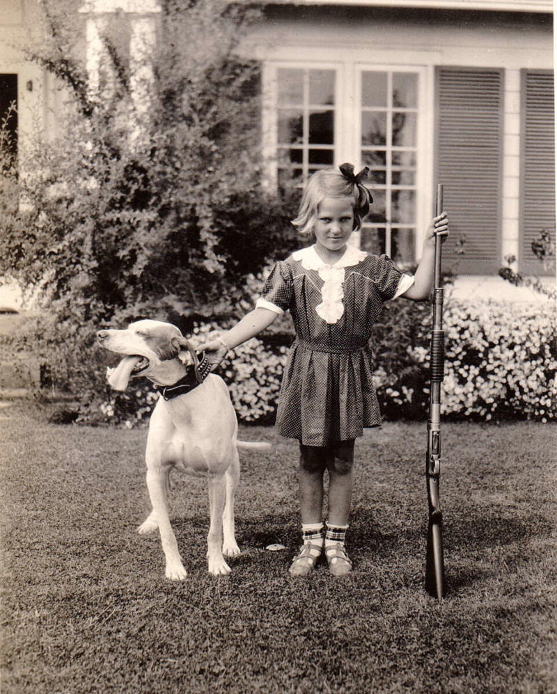 5. Just a young girl and her dog, 1932 1. A World War Veteran, 1932, 2. Jean Bugatti standing next to his Bugatti Royale, one of the seven he built, 1932, 3. This milkmaid is trying to get the pig off the road, Norway, 1932, 4. Joan Crawford, 1932, 5. Just a young girl and her dog, 1932, 6. Taking a break after their tennis match, Washington DC, 1932, 7. Charles Ebbets shooting his famous photo, Lunch atop a Skyscraper, 1932, 8. Rocking the fur coats and a Cadillac in Harlem, 1932, 9. Painting the Eiffel Tower in 1932, 10. Sitting in peace in NYC, 1932, 11. Driving a dynasphere, 1932, 12. Harpo Marx and Amelia Earhart on the set of Horse Feathers, 1932, 13. Jacob Rheuben Ehrlich (8 ft 6 in) walking the Chicago streets with kids, 1932, 14. Sitting on a truck, playing her guitar in Amarillo, Texas, 1932, 15. A family portrait in Poland, 1932, 16. A colorized portrait of Amelia Earhart, 1932, 17. A woman bringing her pet cat to have a cup of tea, 18. Charles C. Ebbets snapping photos on a skyscraper, 1932, 19. Young Love, 1932, 20. Stan Laurel and Oliver Hardy taking a break from filming, 1932, 21. Fighting their way through the snow, 1932, 22. Taking an extremely unsafe nap, 1932, 23. Street fashion in Japan, 1932, 24. This is what packing for a camping trip looked like in 1932