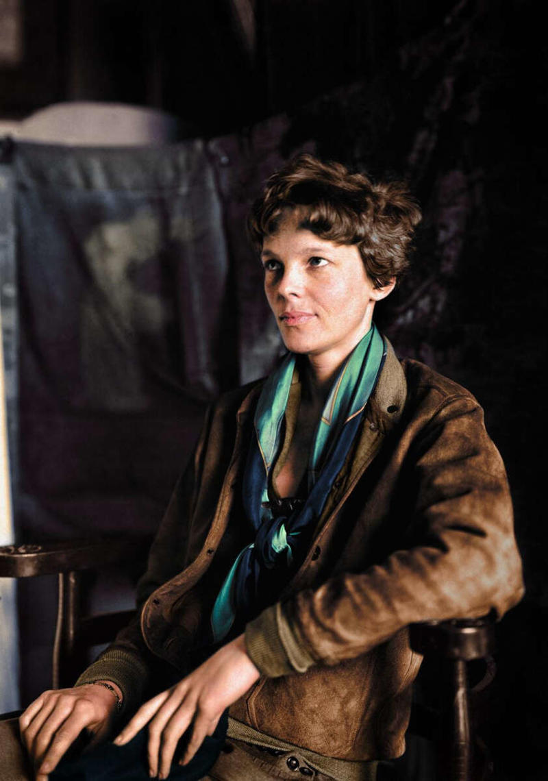 16. A colorized portrait of Amelia Earhart, 1932 1. A World War Veteran, 1932, 2. Jean Bugatti standing next to his Bugatti Royale, one of the seven he built, 1932, 3. This milkmaid is trying to get the pig off the road, Norway, 1932, 4. Joan Crawford, 1932, 5. Just a young girl and her dog, 1932, 6. Taking a break after their tennis match, Washington DC, 1932, 7. Charles Ebbets shooting his famous photo, Lunch atop a Skyscraper, 1932, 8. Rocking the fur coats and a Cadillac in Harlem, 1932, 9. Painting the Eiffel Tower in 1932, 10. Sitting in peace in NYC, 1932, 11. Driving a dynasphere, 1932, 12. Harpo Marx and Amelia Earhart on the set of Horse Feathers, 1932, 13. Jacob Rheuben Ehrlich (8 ft 6 in) walking the Chicago streets with kids, 1932, 14. Sitting on a truck, playing her guitar in Amarillo, Texas, 1932, 15. A family portrait in Poland, 1932, 16. A colorized portrait of Amelia Earhart, 1932, 17. A woman bringing her pet cat to have a cup of tea, 18. Charles C. Ebbets snapping photos on a skyscraper, 1932, 19. Young Love, 1932, 20. Stan Laurel and Oliver Hardy taking a break from filming, 1932, 21. Fighting their way through the snow, 1932, 22. Taking an extremely unsafe nap, 1932, 23. Street fashion in Japan, 1932, 24. This is what packing for a camping trip looked like in 1932