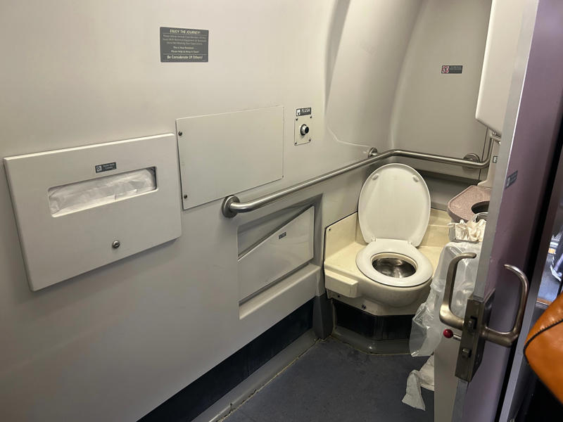 The coach bathroom was significantly more spacious than an airplane bathroom.