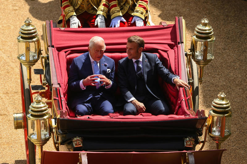 Key Points, Camilla wears Queen Elizabeth II’s sapphire suite, Mick Jagger and Elton John top star-studded guest list for state banquet, Kate and William pictured smiling together outside in gardens of Windsor, Highlights from day one of Macron's state visit, Royal family speaks of 'L’Entente Cordiale in the Kitchens!', Macron presses for recognition of Palestine as ‘only path to peace’, King set to emphasise 'multitude of complex threats' facing Britain and France, Starmer and Macron lay wreaths by Churchill statue and face hecklers, Kate to attend first state banquet in two years, President lays wreath, Analysis: Migration and Donald Trump set to add frisson to discussions, Watch: Macron jokes Bayeaux Tapestry loan took longer to deliver than Brexit, We must reduce reliance on China and US, Macron warns, UK and France will save Europe by example, French leader says, We must protect international order, Macron says, Watch: Macron says France and UK ‘must fix illegal migration burden’, Standing ovation for president, Macron calls for opportunities for young for virtual exchanges, Analysis: Macron promises ‘closest cooperation’ on migration - but something is missing, Macron calls for cooperation with other nations to curb illegal migration, Democracy attacked daily, says Macron, Macron calls for state of Palestine to be recognised, We will never abandon Ukraine, says Macron, Analysis: Macron’s warmth to “dear Keir” on display, Macron thanks Starmer, Applause for Macron, King invites guests to drink Louis XIII cognac, Lords and MPs gather to hear Macron in Parliament, Bayeux Tapestry to be loaned to England for first time, Pomp, pageantry and politesse greet French president, Macrons view royal collection, King to tell Macron: No fortress can shield us from threats, UK-France relationship as strong as ever, PM says, King and Macron share warm moment amid pomp-filled Windsor welcome, King experiences burst blood vessel in eye, King, Queen and the Macrons ride together through Windsor, King and Queen warmly welcome Macrons, King and Queen await the Macrons, King and Macron to ride together through Windsor in historic carriage procession, The pomp and pageantry of Macron's state visit, Kate and William at RAF Northolt to welcome Macron, Pictured | Police in Windsor prepare for Macron's visit, Windsor Castle prepares for French guests, Labour billionaire backer John Caudwell ‘nervous’ about Starmer after winter fuel ‘fiasco’, Davey urges Starmer and Macron to unite against Trump's tariffs, Recap | French police ‘slash small boats with knives’ to prevent Channel crossings, Breaking | Norman Tebbit, prominent minister in Thatcher government dies aged 94, How many small boats crossings have there been this year?, Welcome to The Independent's live politics coverage
