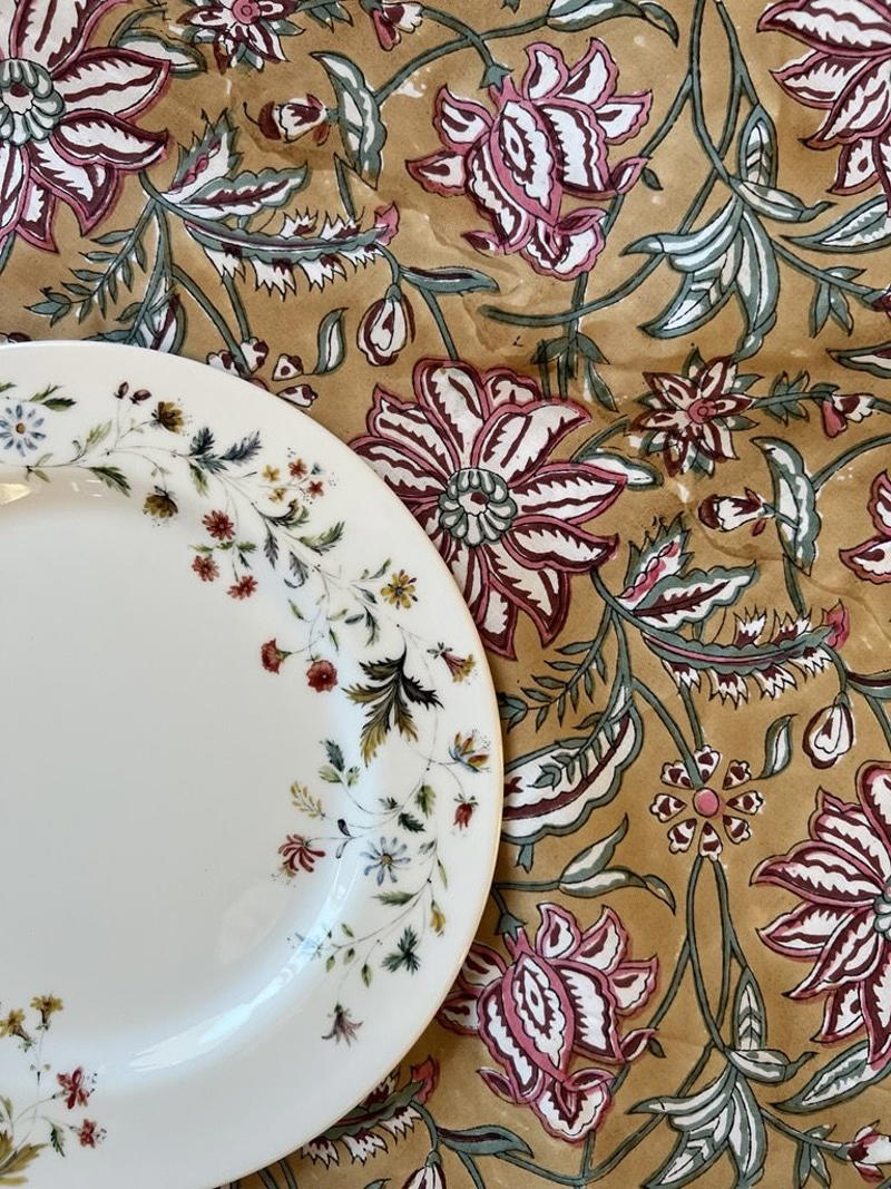 A Velvet Sofa, Formal Everyday China, Jute Rug, Unlacquered Brass