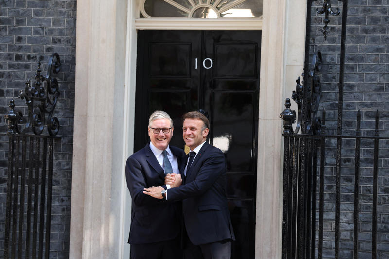 Key Points, UK coastguard responding to multiple migrant crossings in English Channel, Recap: New tactics will tackle illegal migration, vows Starmer, Watch: Starmer and Macron warmly embrace outside No 10, Defence not affected by Brexit, says Macron, Recap: 'Will you shut up': Farage's anti-Macron speech interrupted by hecklers, UK and France to 'bring Putin to negotiating table', says Starmer, New tactics will tackle illegal migration, vows Starmer, Pictured: Inside the UK-France summit, Pictured: Starmer and Macron embrace ahead of crunch summit, Analysis: Now, Starmer the statesman needs to up his game at home, Progress on small boats ‘slow’, but joint action is coming, Healey says, Healey says migrant deal only possible under Labour, Channel migrant: ‘I will not stop until I get to Britain’, Migrants must see the risk of Channel crossing, Dover MP says, ‘No single solution’ to small boat crisis, Healey says, Stopping the boats is ‘shared challenge’, Healey declares, Fifty migrants a week could be sent back to France under deal, What is the 'one in, one out' deal?, Brigitte Macron: Who is the wife of French President Emmanuel Macron?, Watch: Starmer hosts Macron for crunch migration talks, Small boats crisis 'requires shared solutions', Macron and Starmer agree, Watch: Starmer's blunt one-word answer to tax grilling, UK-France alliance is 'more important than ever', Starmer says, Watch: Farage’s anti-Macron speech drowned out by hecklers, Macrons attend banquet at Guildhall this evening, Comment: Now, Starmer the statesman needs to up his game at home, Pictured: Macron visits Downing Street for crunch migration talks, Macron credits King with helping secure Bayeux Tapestry loan deal, Brigitte Macron: Who is the wife of French President Emmanuel Macron?, Winking Macron clinks glasses with royals at dazzling state banquet, What is a state visit?, Starmer and Macron brought 'sanity back' to Britain-France relationship, Osborne says, 'Will you shut up': Farage's anti-Macron speech interrupted by hecklers